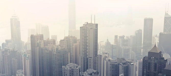 high-rise-buildings-at-daytime- by Andrea Piacquadio city covered in a layer of smog